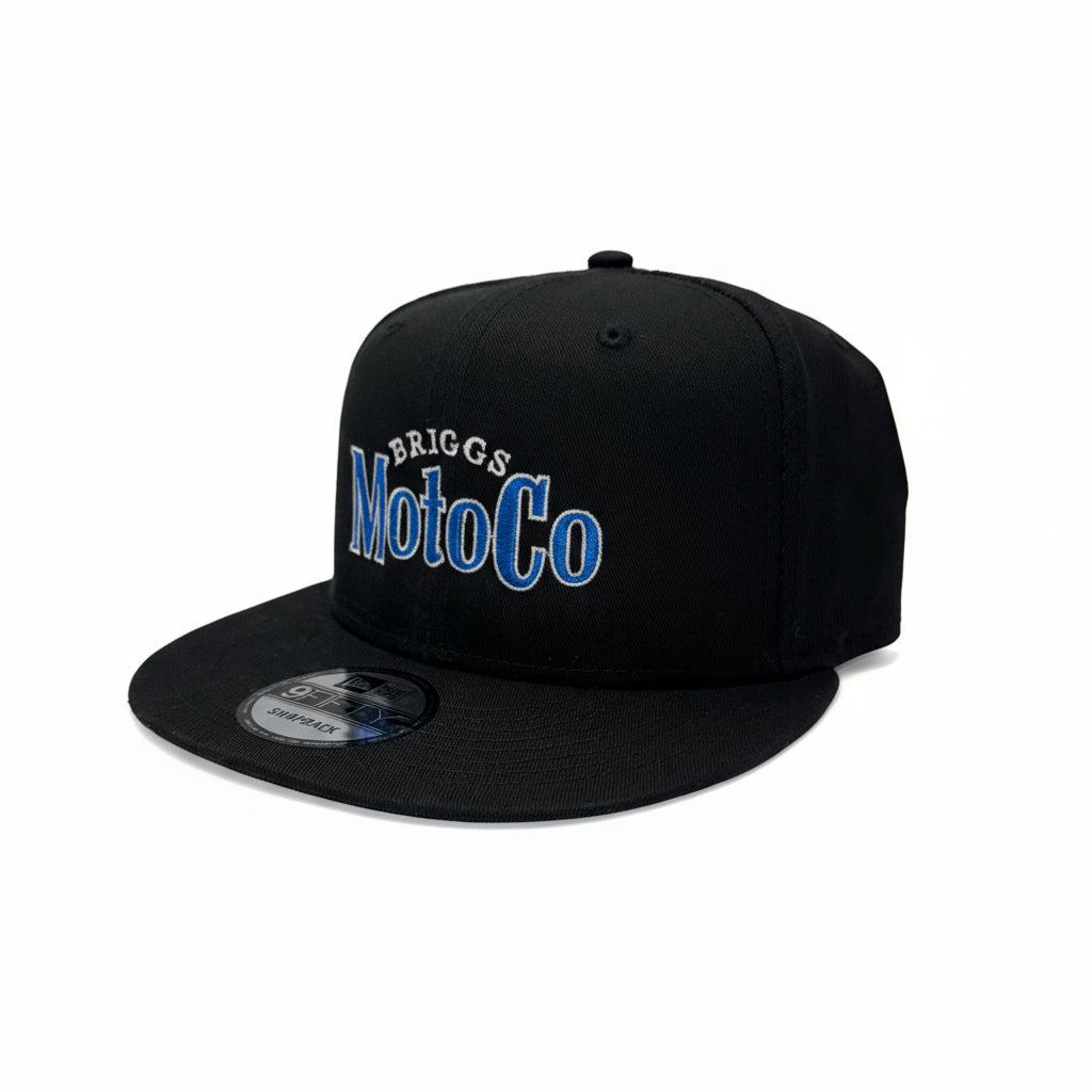 Black motocross themed hat embroidered with Briggs MotoCo mimicking hte classic Modelo logo